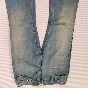 Denim boot cut with design on back pocket